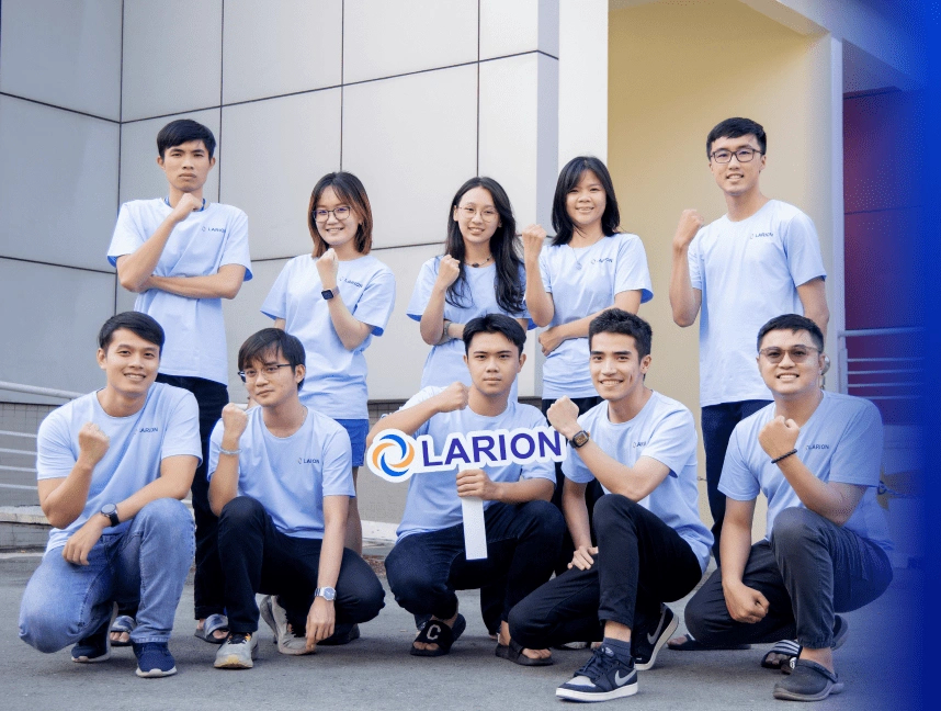 LARION employees standing together | LARION